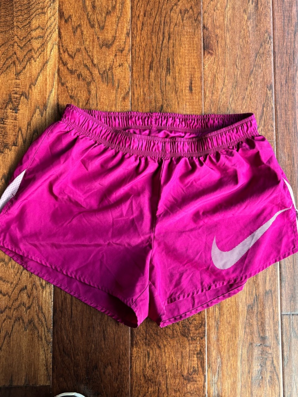 Nike Women's Bright Magenta Athletic Shorts with White Swoosh